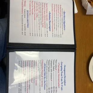 a menu and a plate of chips