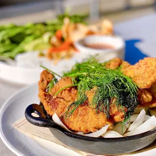 Chả Cá Thăng Long: Classic Turmeric Fried Fish w/ banh hoi rice noodles, fermented shrimp+pineapple sauce, shrimp chips | $28