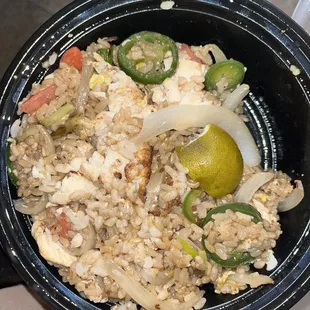 ice and vegetables in a black bowl