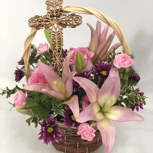 Pastel Spring Colors in shades of purples and pinks using fresh flowers, greenery and filler that include Asiatic lilies, standard roses, pi