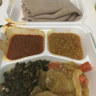 Veggie combo #8--miser (red lentils), kike (yellow peas), tikel gomen (cabbage wot) and gomen (collard greens)