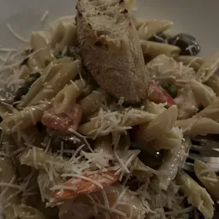 Penne with asparagus, shrimps (with tails), Italian sausage and filet with Gorgonzola cream sauce.Way too much asparagus.