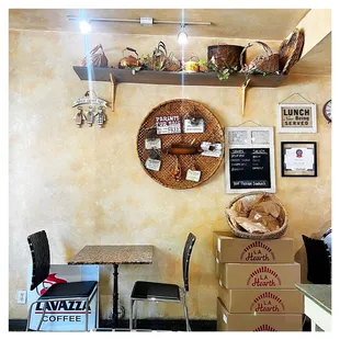 a table and chairs in a coffee shop