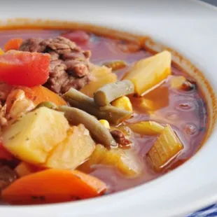 a bowl of beef and vegetable soup
