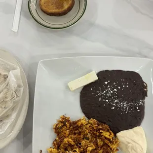 Chorizo con huevos, black beans, and Guatemalan queso (served with housemade tortillas)