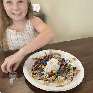 Fettuccine crêpe with strawberries and cookies and cream ice cream
