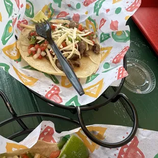 Asada tacos with pico and cheese