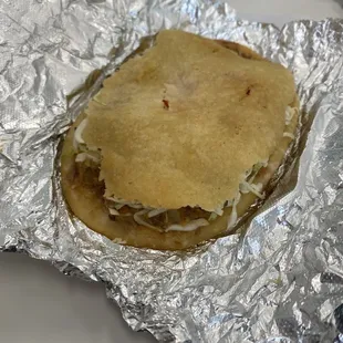 A well served 7.5" x 5" super gordita, this bad boy of deliciousness will put a dent in your appetite.