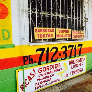 a sign on the side of a building