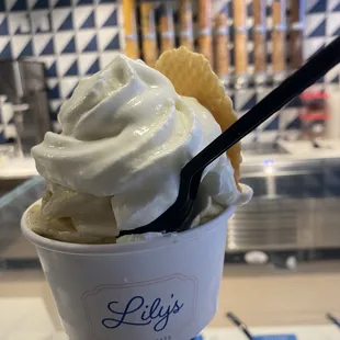 Vanilla scoop cup with Kit Kat and Fruity pebbles blended. She added whipped cream at my request