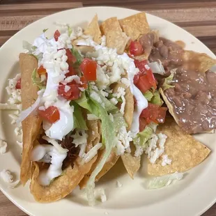 Delicious Chicken &amp; beef Hard shell tacos, beans &amp; chips included