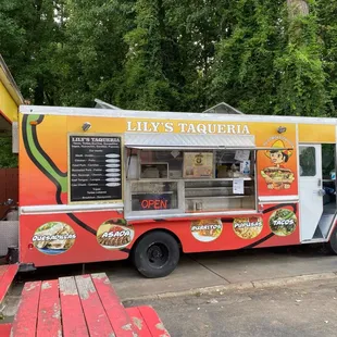 a food truck parked in front of a building