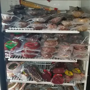 a display case of meats