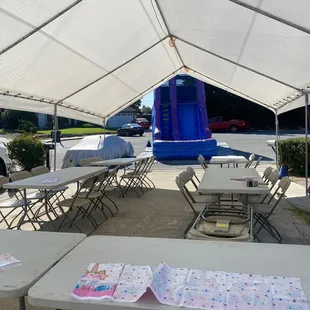 20 x 30 canopy Water slide Table and chairs
