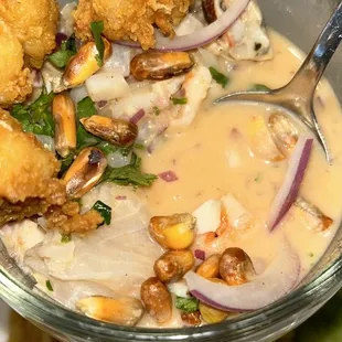 a bowl of food with a spoon in it