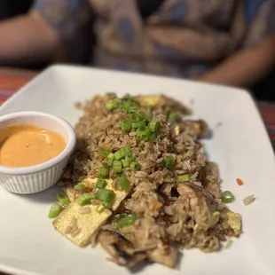 a plate of food with sauce