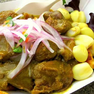 Our Seco: Different kind of meats cooked in a cilantro and red wine stew.