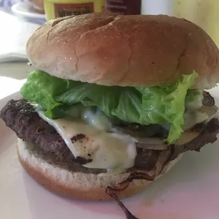 Steak burger with grilled onions and pepper jack cheese