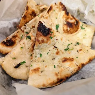 Garlic/Bullet Naan. $3.99. Plain naan, infused with garlic and brushed with butter.