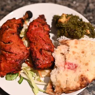 Chicken tandoori, saag paneer, and Peshwari naan.