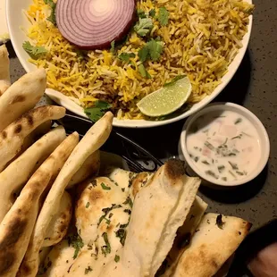 Hyderabad Chicken Dum Biryani (GF),  Garlic Naan, Mint &amp; Basil Naan