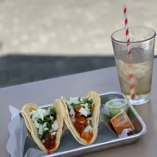 three tacos and a glass of water