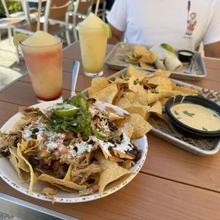 Frozen Strawberry Margarita, Signature Queso &amp; Chips, Grilled Chicken Nachos
