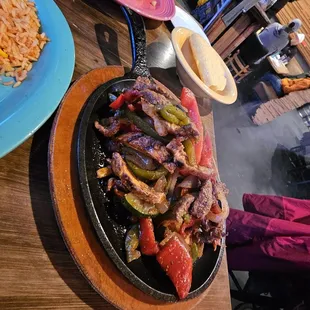 Beef and chicken combo fajitas