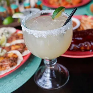 a margarita in a glass on a table