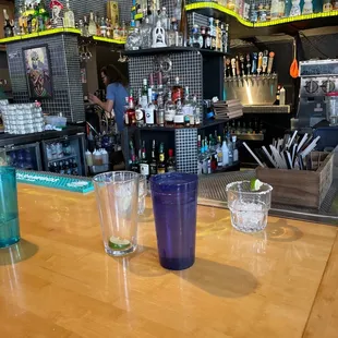 a bar with a wooden bar top