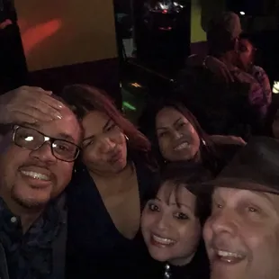 a group of people posing for a picture