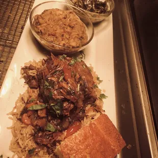 Braised beef short ribs with greens and black eyed peas is an example of a special feature item.