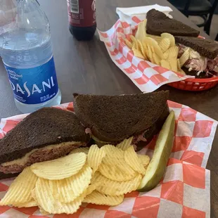 a sandwich and chips on a table