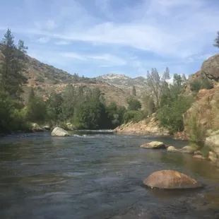 Sandy beach down a rocky path