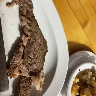 a plate of food and a knife