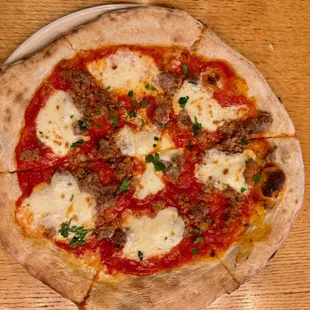 We thought the sausage ($19 as 08/2024) was exceptional.  Classic chewy char.