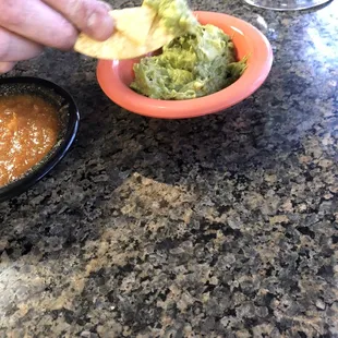 Small guacamole and red sauce