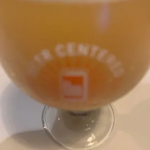 a glass of beer on a table