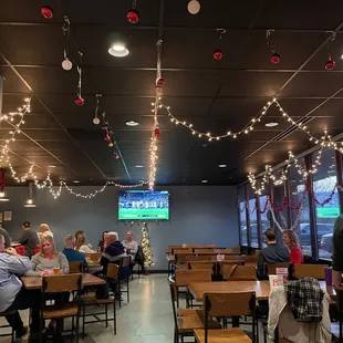 a crowd of people sitting at tables