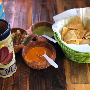 Chips and salsa set up.  Water served in beautiful ceramic.