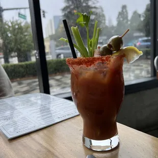 Luscious Bloody Mary - folded crispy pork belly with olives