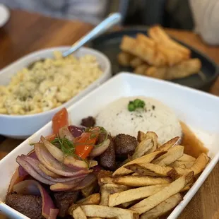 Yuca fries Truffle mac cheese Lomo saltado