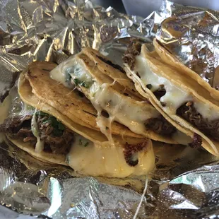 Birria queso tacos IG @denjeneats