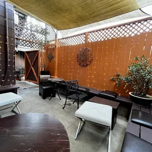 Cute back patio with lights and music