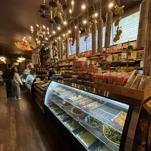 people shopping in a grocery store
