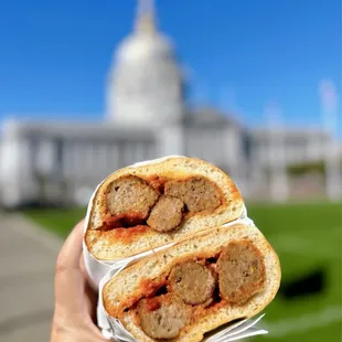 Rompiballe Sandwich: Beef Meatballs w/ spicy red wine marinara sauce, black pepper, melted provolone | $16.95