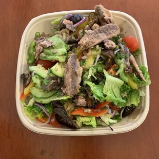 Green salad with anchovies, avocado, roasted vegetables, and my sardines from Costco