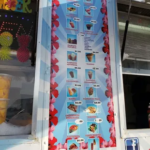 a menu on the side of the truck