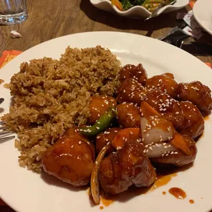 Sesame chicken combo plate  Back: Fried duck