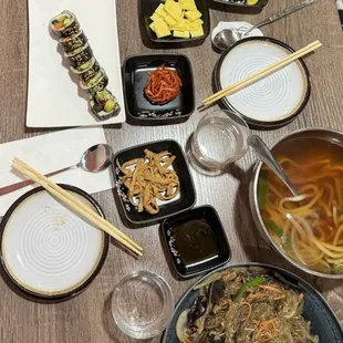 a table full of asian food